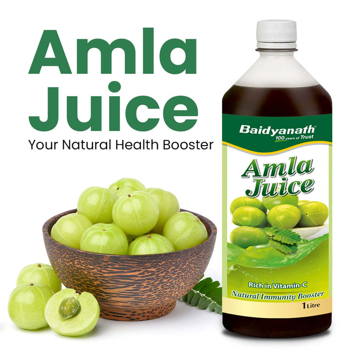 Baidyanath Amla Juice bottle with fresh amla fruits in a bowl, labeled as a natural health and immunity booster rich in Vitamin C.