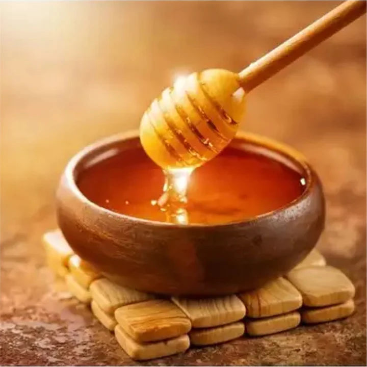 a honey stick dip in full bowl honey