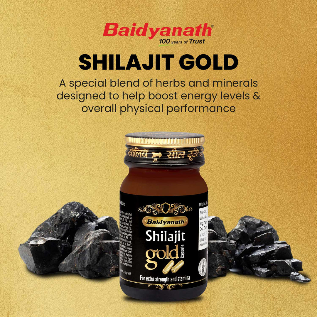 Baidyanath shilajit gold capsule bottle with shilajit stone in background with highlight tag line shilajit gold.